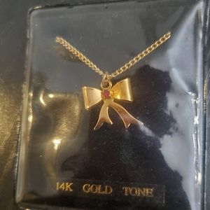 Vintage 14k goldtone bow necklace with faux ruby, garnet birthstone, new
